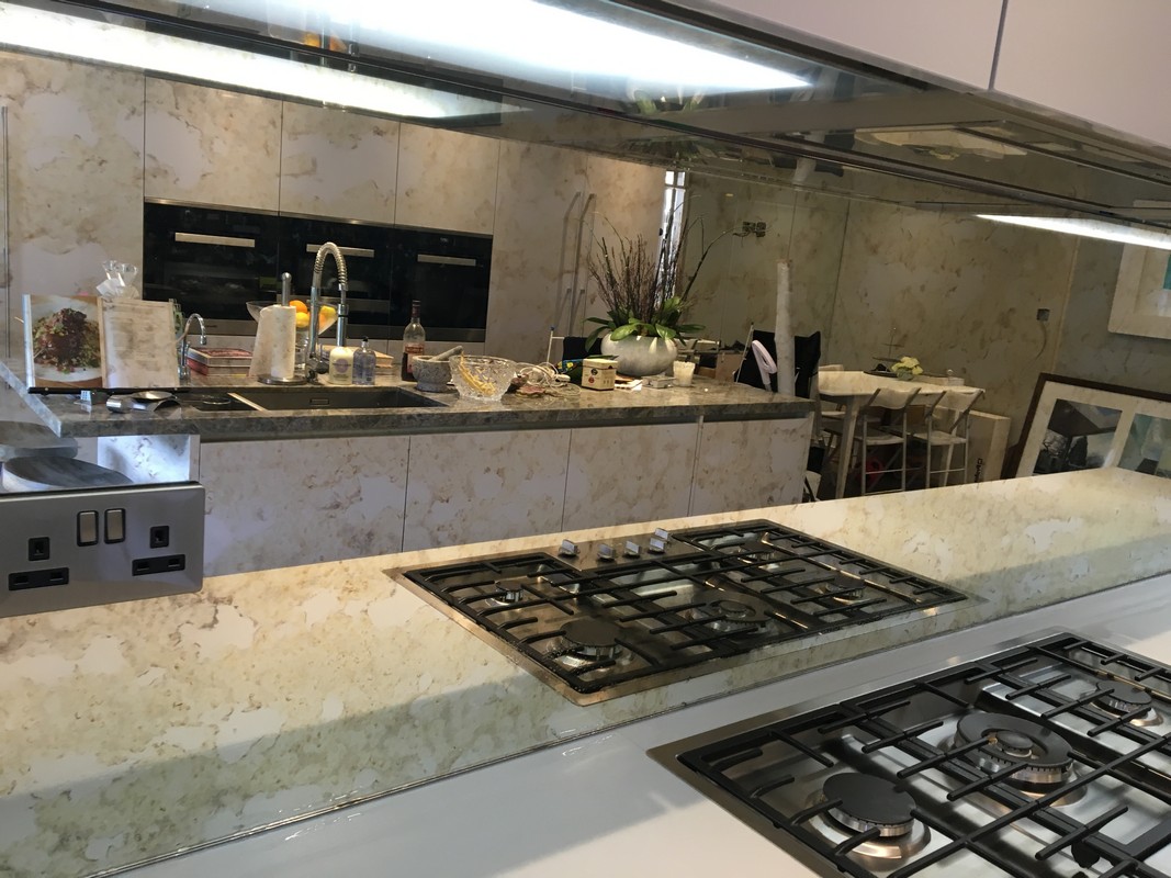 Mirror glass splashback in Lewisham luxury kitchen