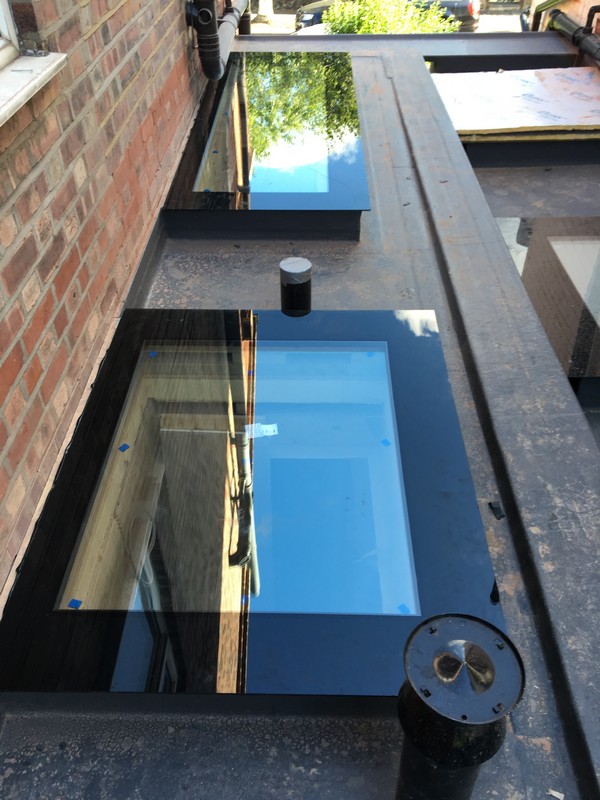 Multiple flat roof skylights on extension in Lewisham